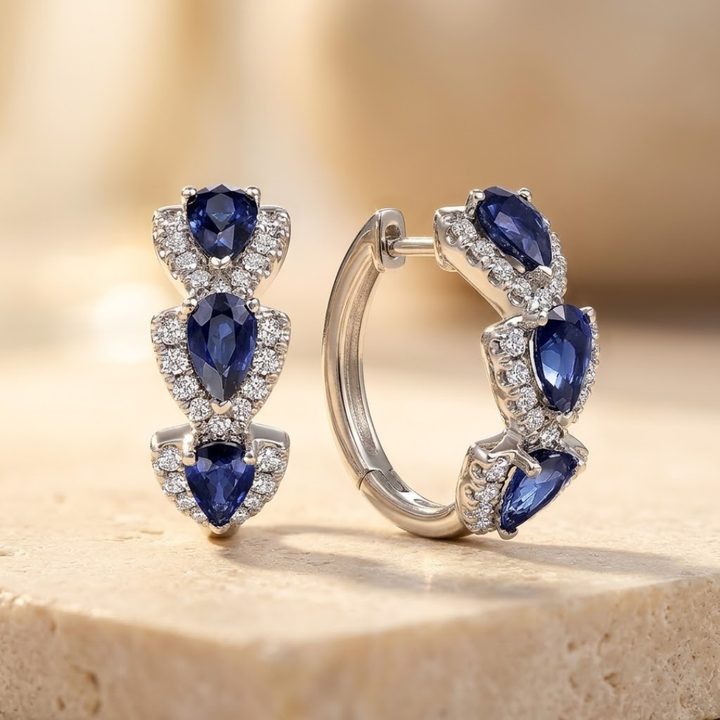 Sapphire-Embellished Silver Hoop Earrings with Halo Design