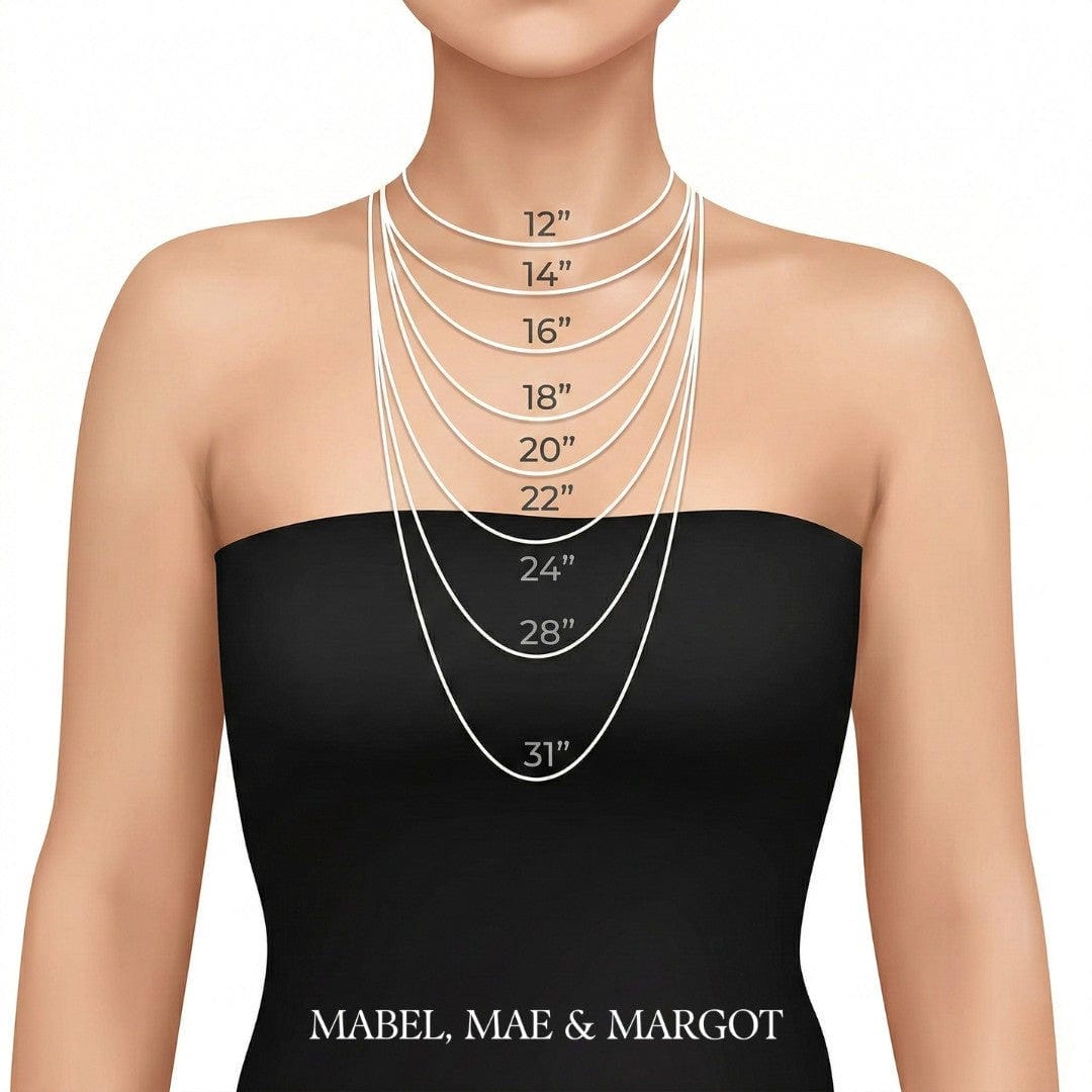 Gold Clover Necklace Adorned with a Heart-Shaped Zircon Pendant