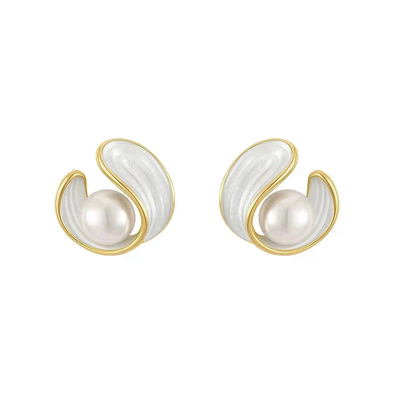 Elegant gold earrings featuring white opals and pearls