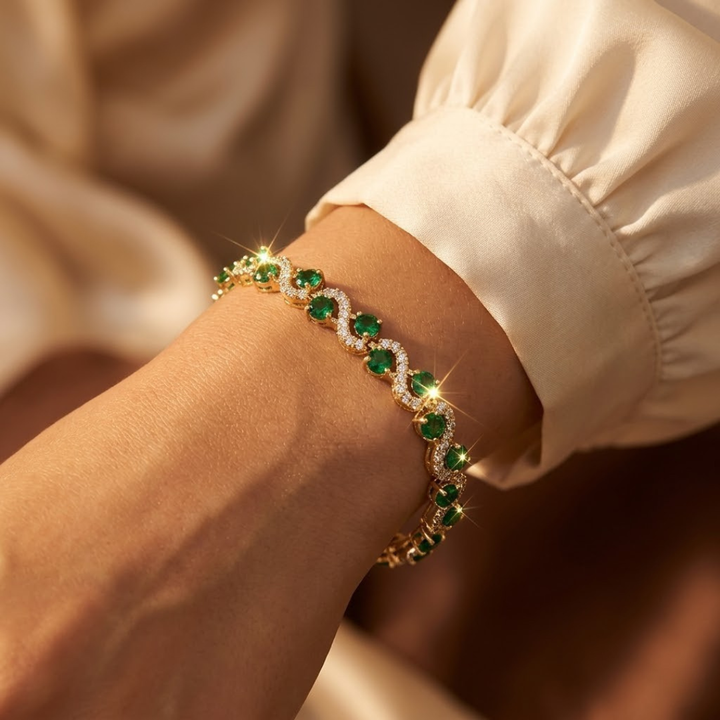 Emerald-Centered Gold Halo Bracelet