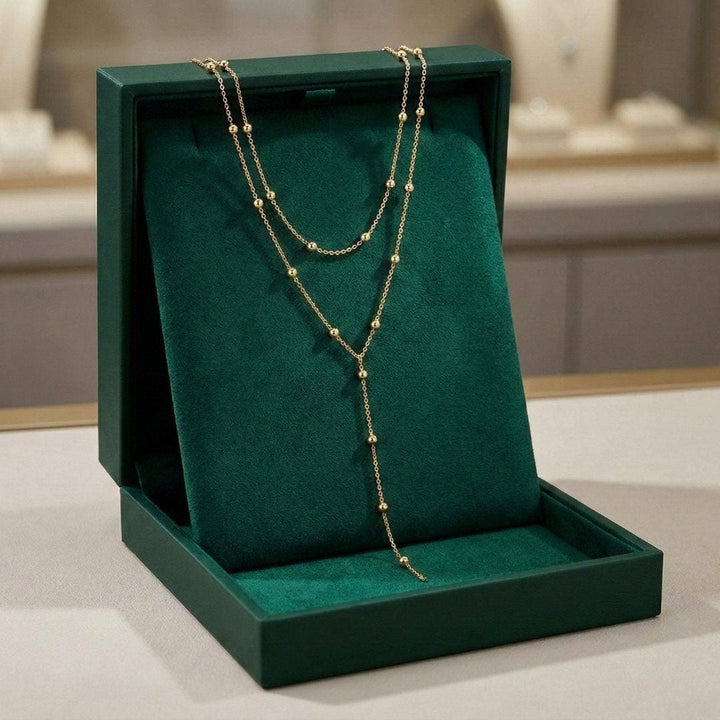 Gold Double-Layered Beaded Necklace with Long Tassels