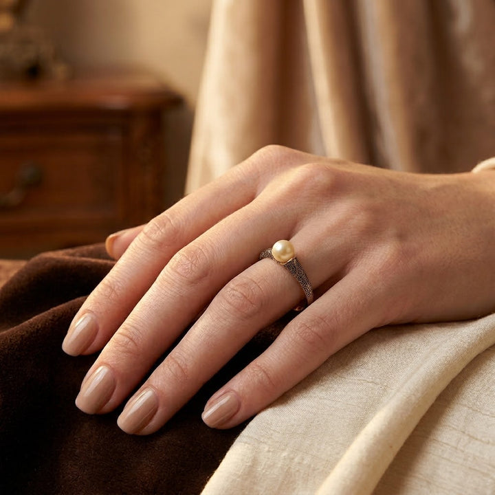 Pearl Ring with Intricate Gold Filigree Design