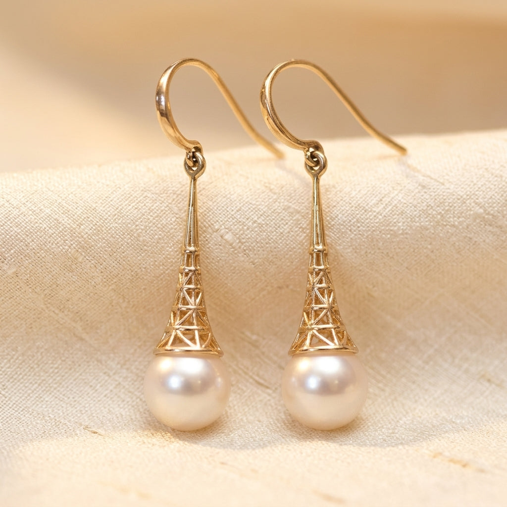Sophisticated Pearl Drop Earrings Featuring Intricate Gold Filigree Design