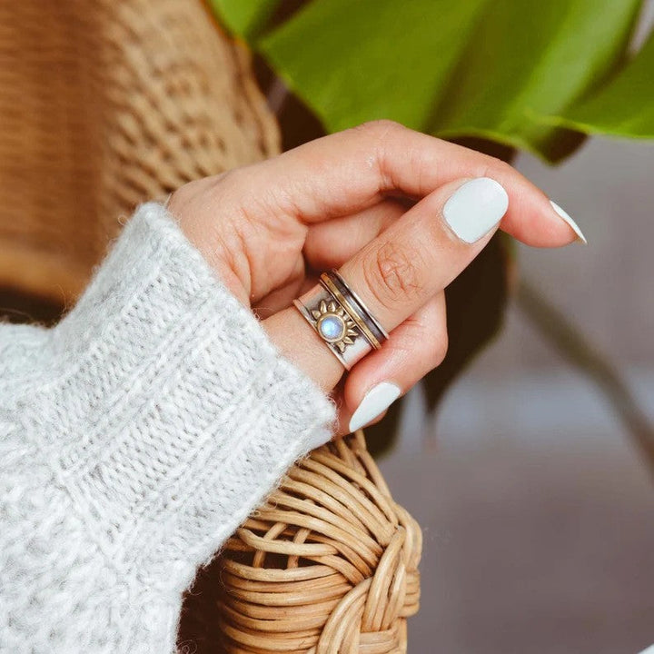 Two-Tone Sun Moonstone Ring with a Wide Silver and Gold Band