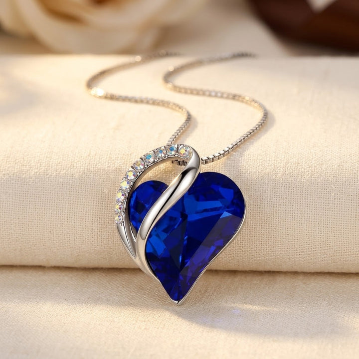 Silver Heart Pendant Necklace with Sapphire Accent