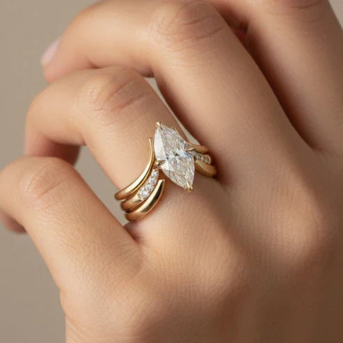 Gold Ring with Drop Crown Design