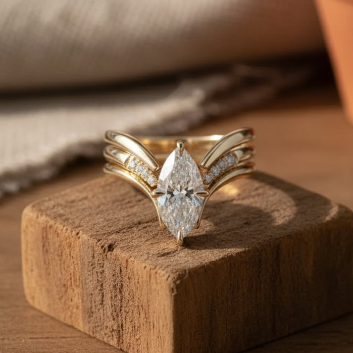 Golden Ring with Draped Crown Design