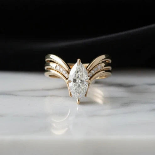 Gold Ring with Drop Crown Design