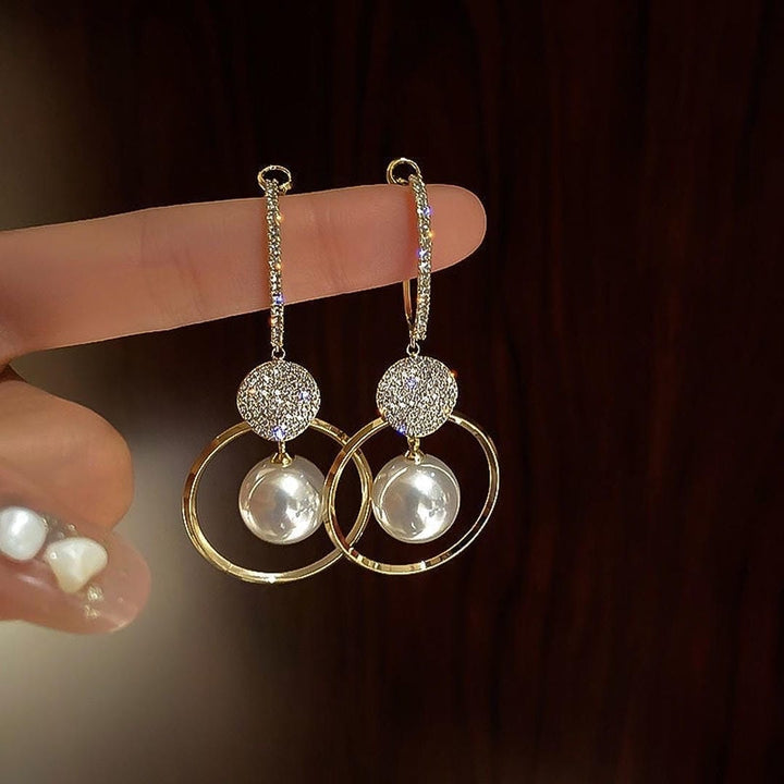 Earrings Adorned with Cultured Pearls and Ornamental Beads