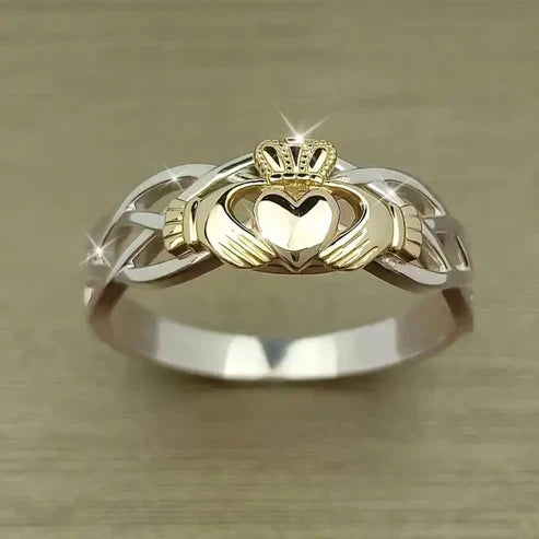 Silver Ring with Gold Crown Design
