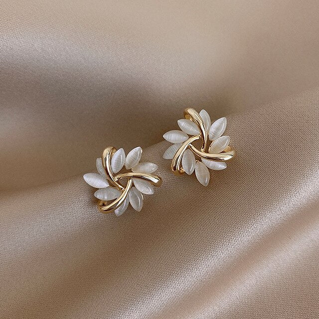 Sophisticated Gold Earrings Featuring White Opal Details