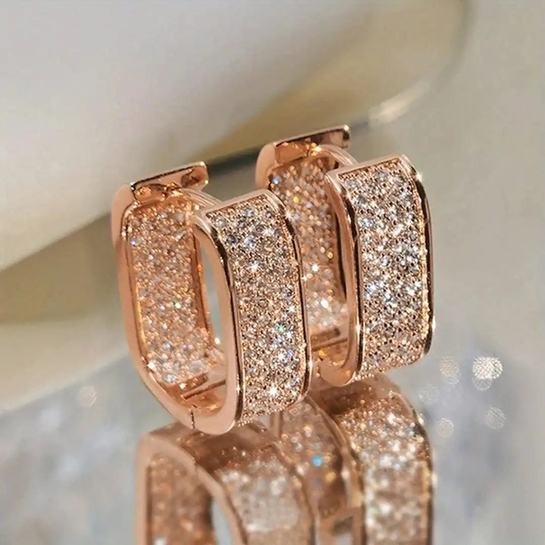 Pavelina Huggie Hoop Earrings