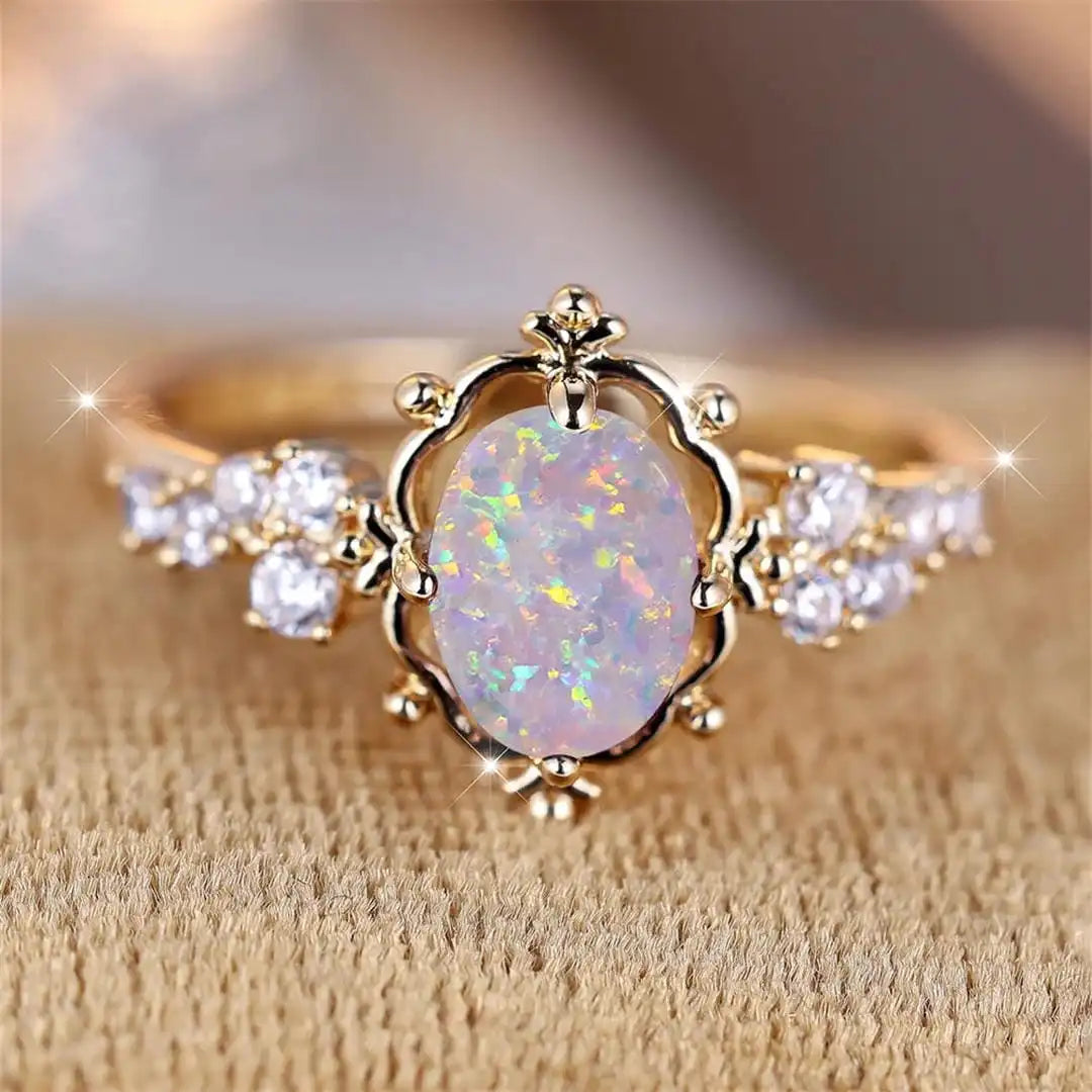 Oval Floral Ring Featuring a White Fire Opal Gemstone