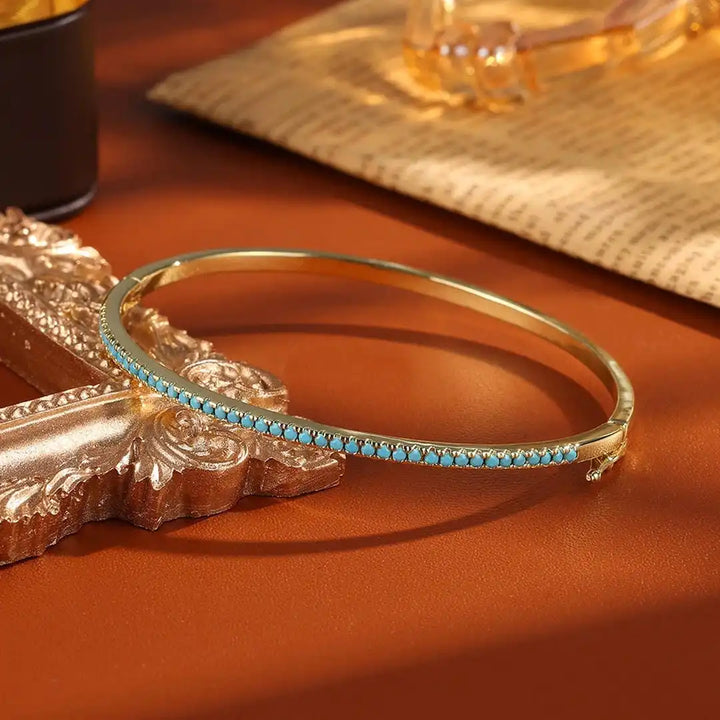 Turquoise Stone Bracelet Featuring Gold Accents