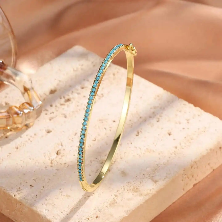 Turquoise Stone Bracelet Featuring Gold Accents