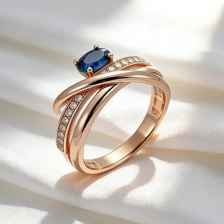 Vintage Rose Gold Cross Ring Featuring Blue Cubic Zirconia