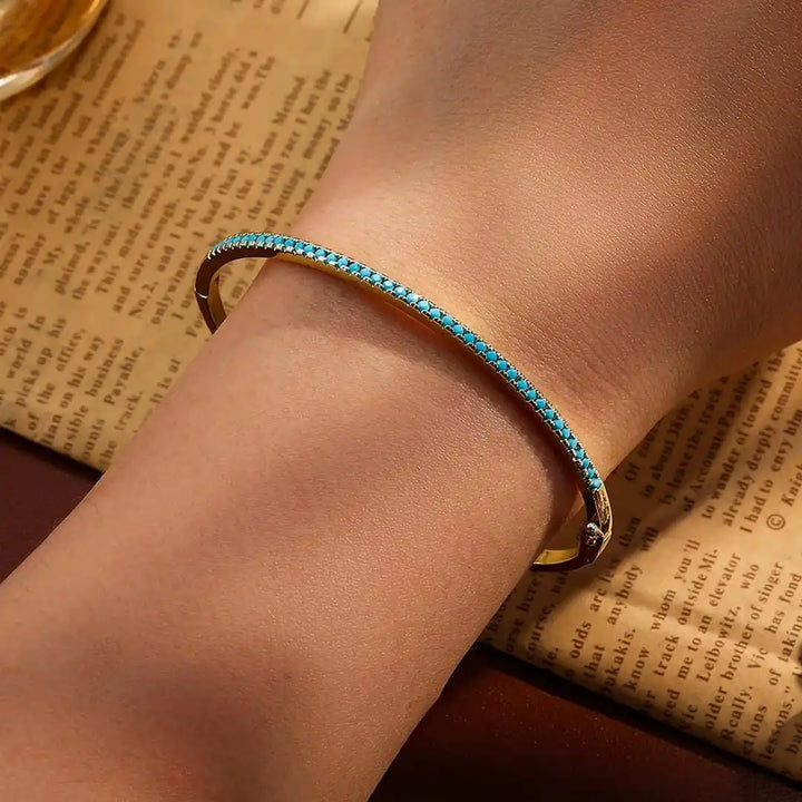 Turquoise Stone Bracelet Featuring Gold Accents