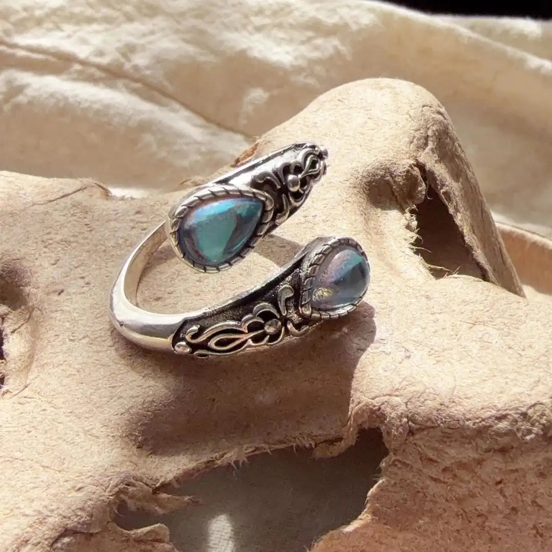 Vintage Adjustable Silver Ring Featuring Blue Stone