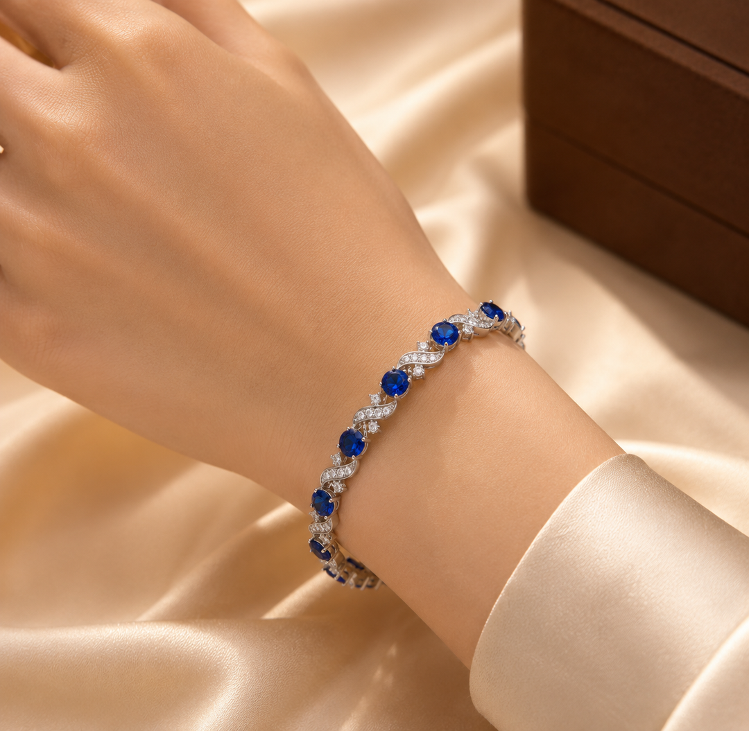 Silver Floral Chain Bracelet with Sapphire Accents