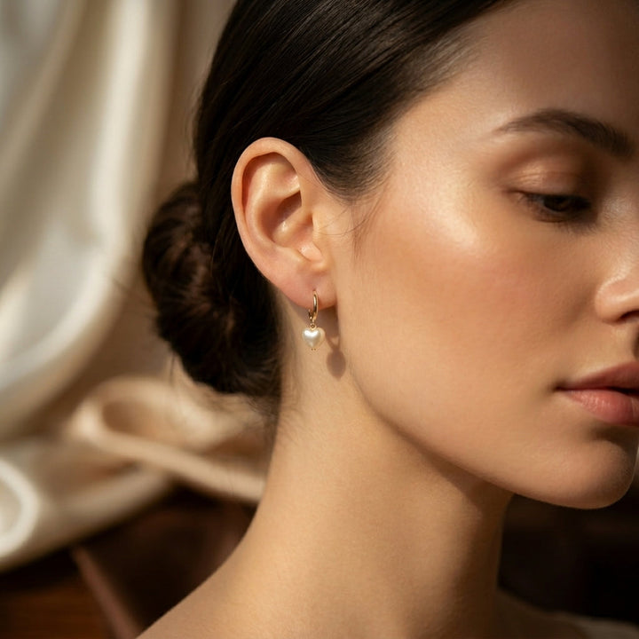 Gold Pearl Drop Earrings with Heart Design