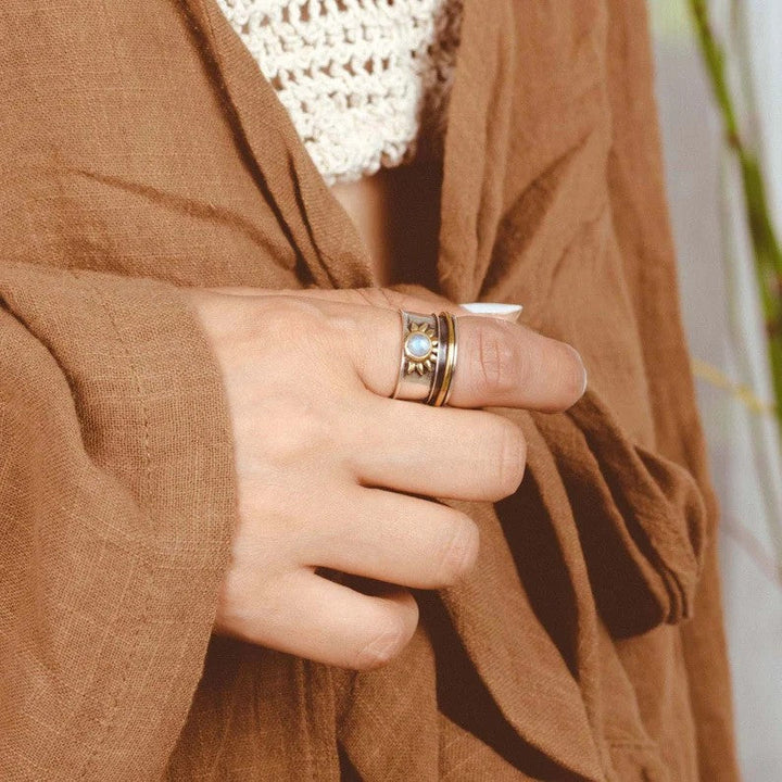 Two-Tone Sun Moonstone Ring with a Wide Silver and Gold Band