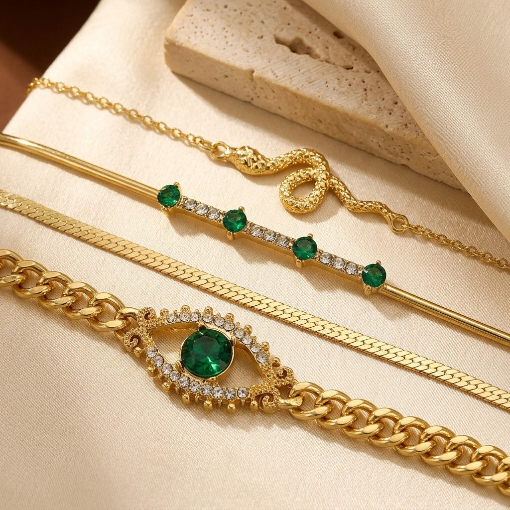 Emerald and Gold Charm Bracelet Collection