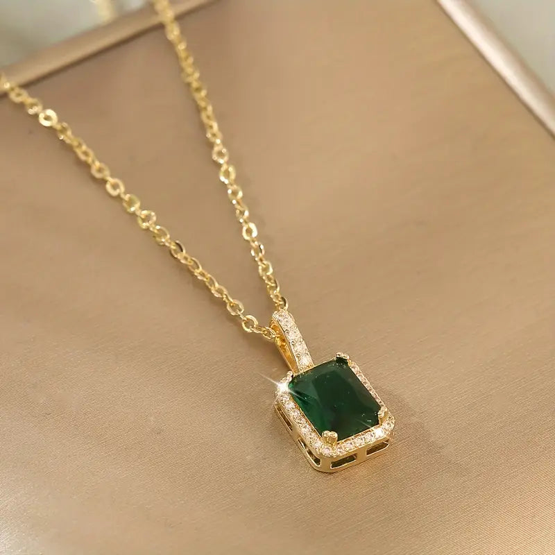 Emerald and Gold Rectangular Halo Pendant Necklace
