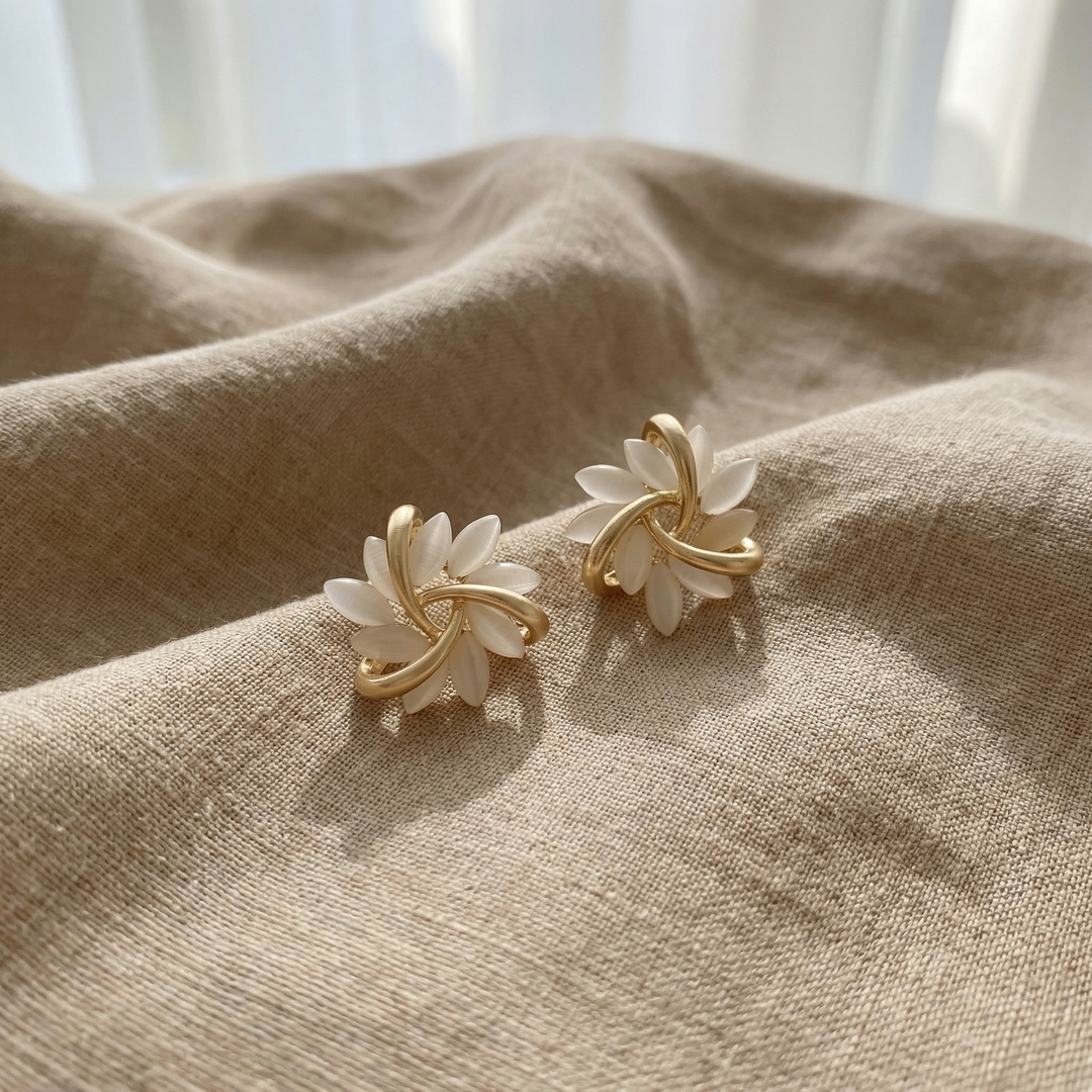 Sophisticated Gold Earrings Featuring White Opal Details