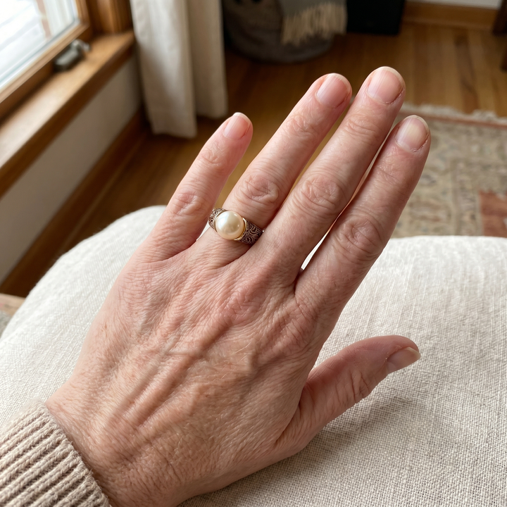 Timeless Gold Band Featuring a Vintage Pearl