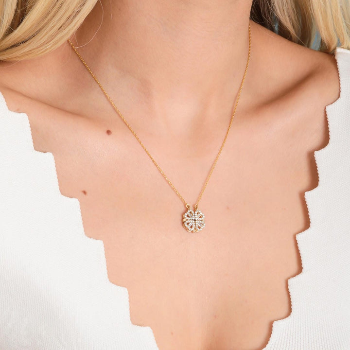 Gold Clover Necklace Adorned with a Heart-Shaped Zircon Pendant