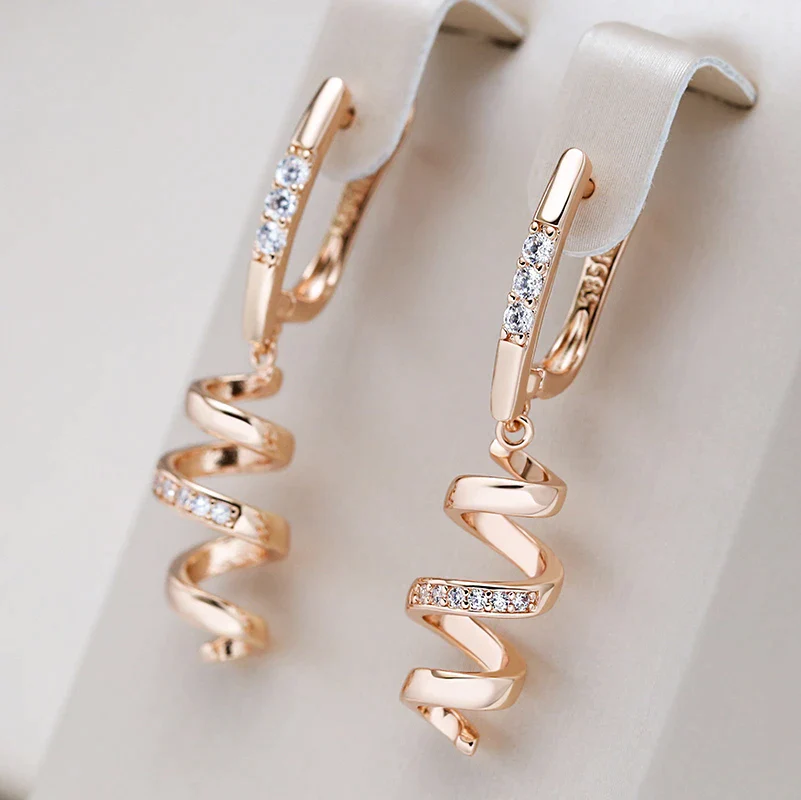 Elegant Gold Spiral Zirconia Earrings