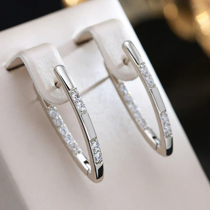 Elegant Gold Earrings Featuring Zirconia Details