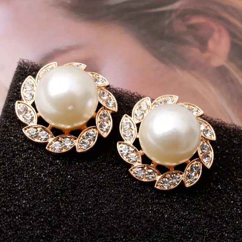 Elegant Pearl and Shimmering Leaf Earrings