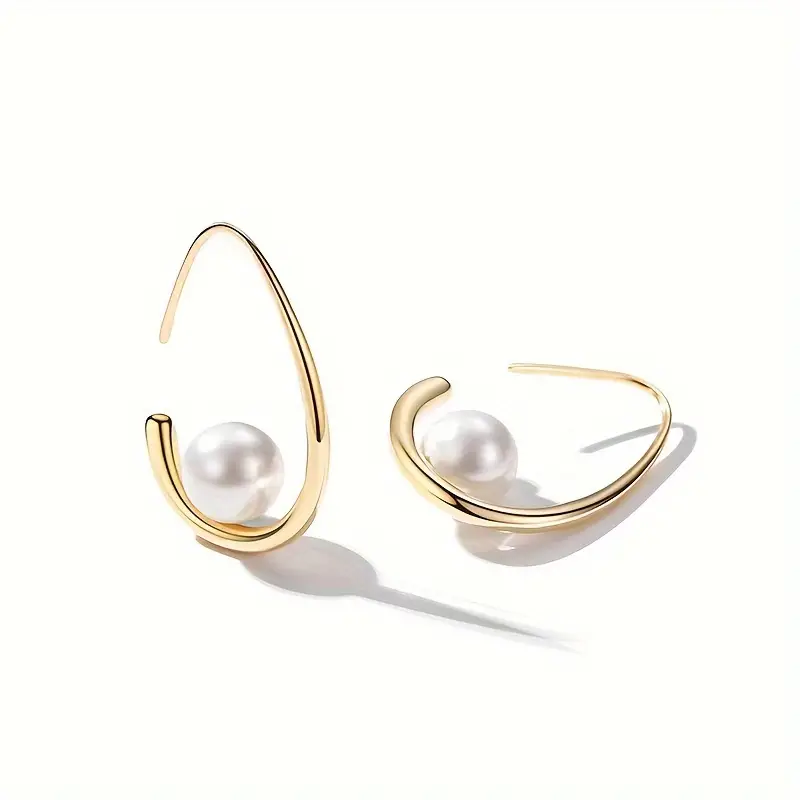 Elegant Gold Earrings Embellished with Pearls