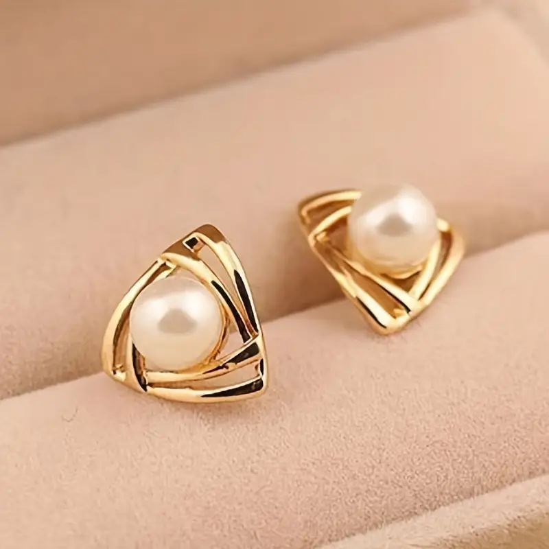Elegant Gold Earrings Featuring Pearl Details