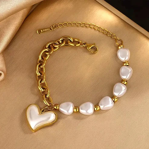 Gold Bracelet with White Heart Charm