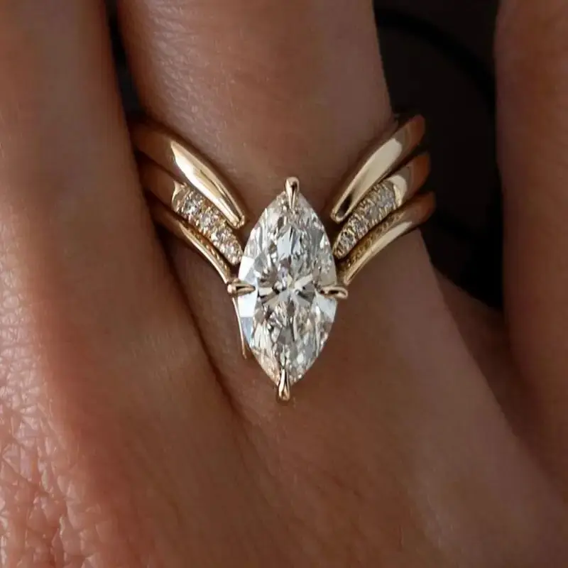Golden Ring with Draped Crown Design