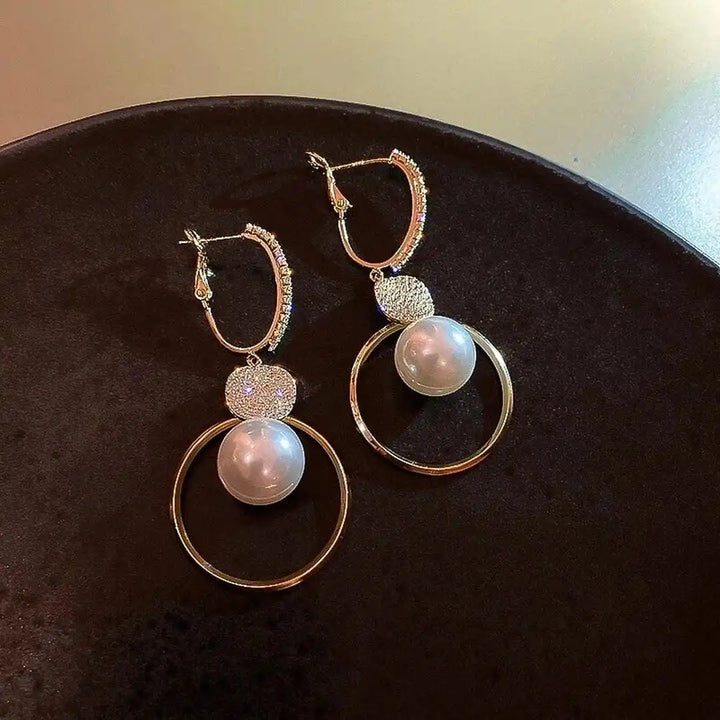 Earrings Adorned with Cultured Pearls and Ornamental Beads