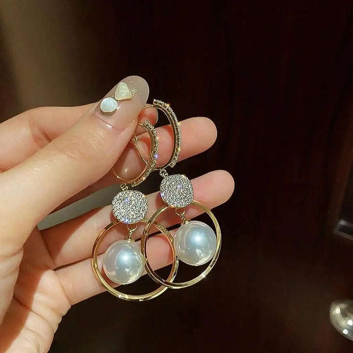 Earrings Adorned with Cultured Pearls and Ornamental Beads